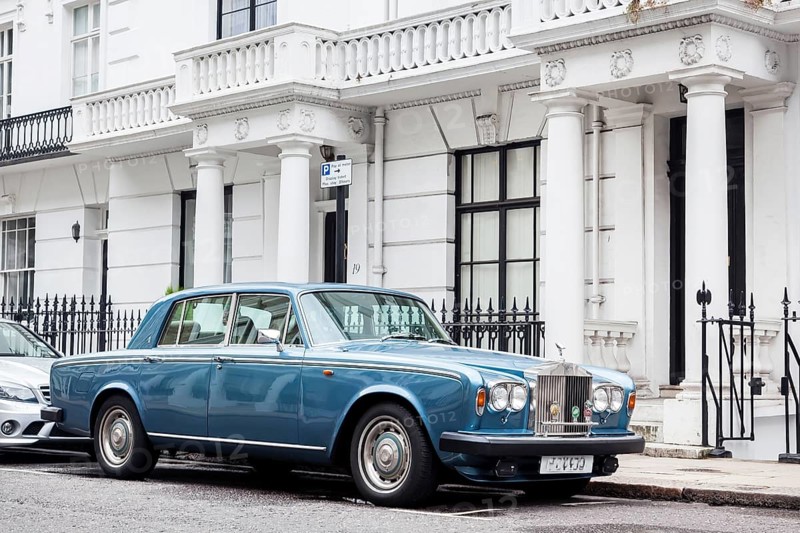 A Rolls Royce Silver Shadow II parked in front of a row of houses in the exclusive district of Knightsbridge