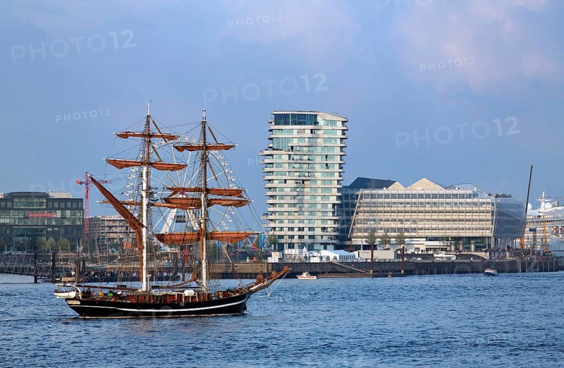 Historic sailing ship in front of esidential Marco Polo Tower and Unilever-Haus office building