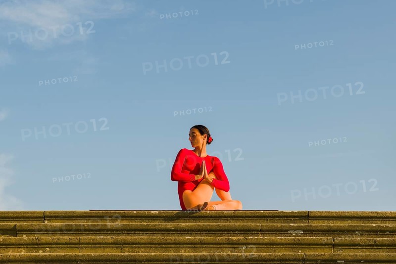 Young woman practising Hatha yoga