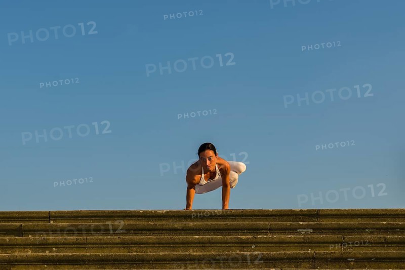 Young woman practising Hatha yoga
