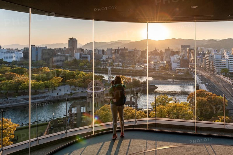 Woman looking from observation platform of Hiroshima Orizuru Tower