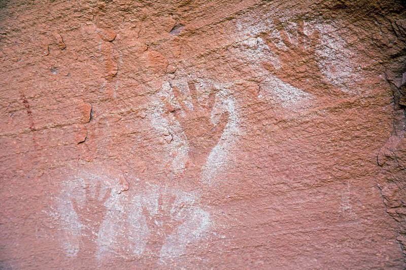 Ancient Anasazi hand pictographs on a cliff high above the Colorado River