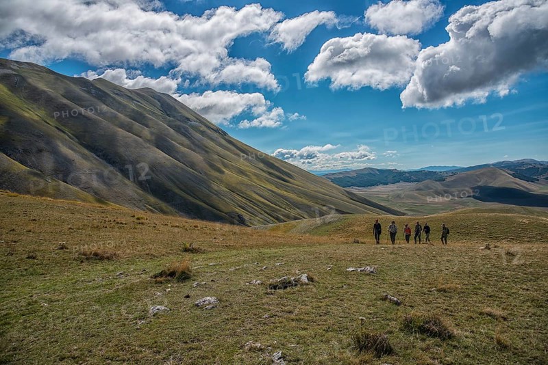 Trekkers on Piano Grande plateau