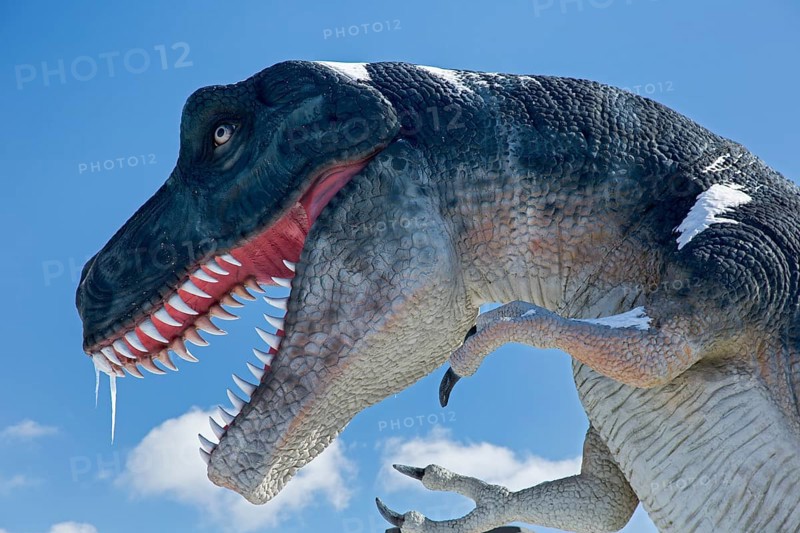 A dinosaur sculpture in a dinosaur park