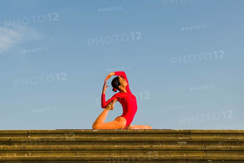 Young woman practising Hatha yoga