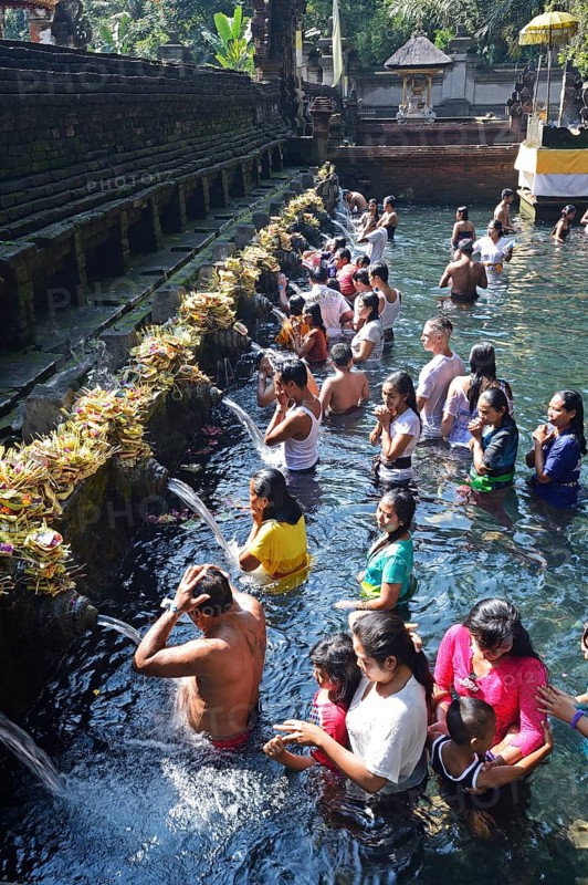 People doing ritual ablution in the Tirta Empul Water Temple