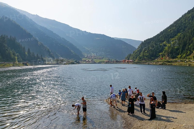 Tourists on the shore of lake Uzungol