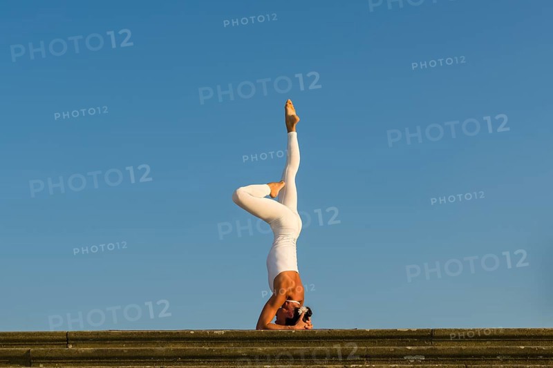Young woman practising Hatha yoga