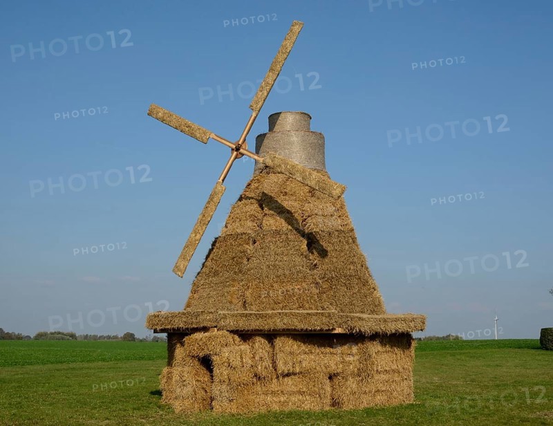 Windmill made of straw bales