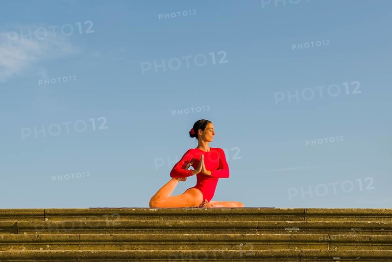 Young woman practising Hatha yoga