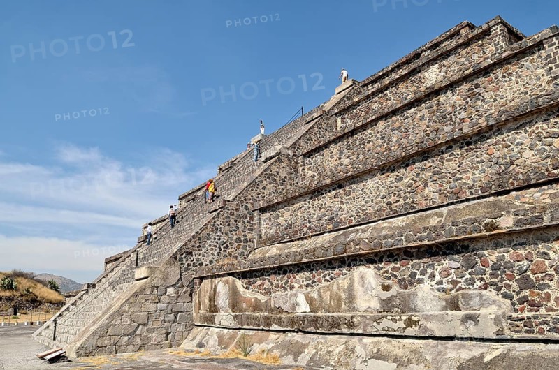 Tourists climbing the Pyramid of the Moon