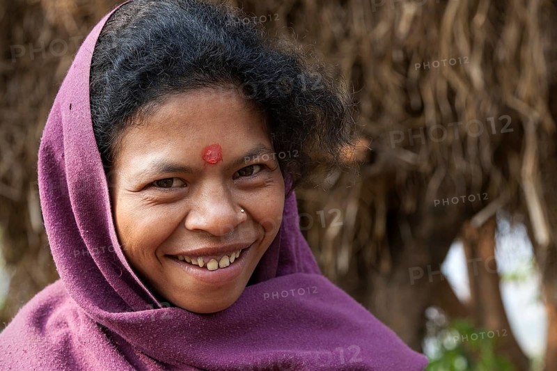 Nepalese woman with purple headscarf