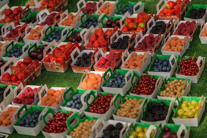 Berries in punnets on sale at a farmers' market in Provence