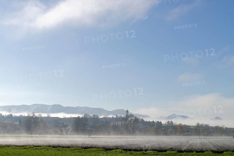 Fog above the fields in autumn