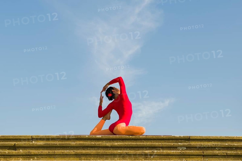 Young woman practising Hatha yoga