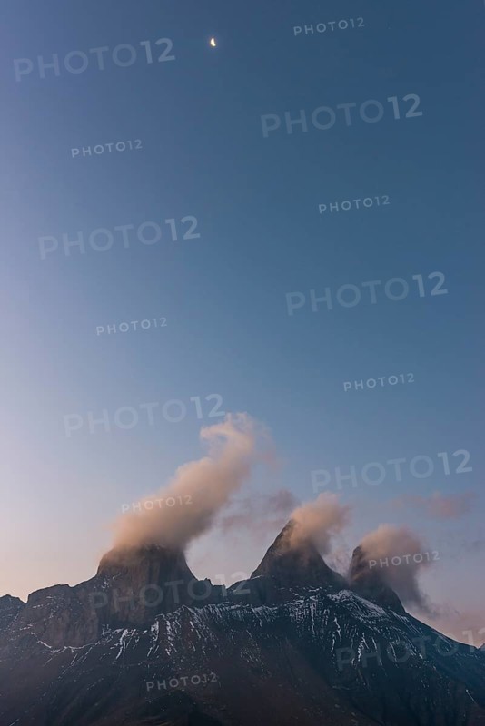 Aiguilles d'Arves mountain at dawn with the moon