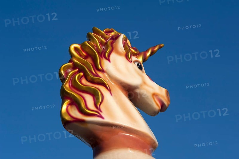 Unicorn figurine on a children's carousel