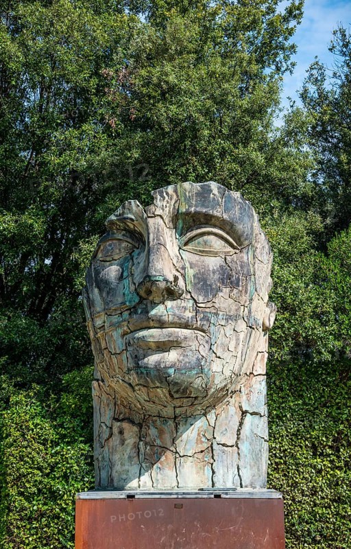 Head of a Roman giant sculpture by Igor Mitoraj in the Boboli Gardens or Giardino di Boboli