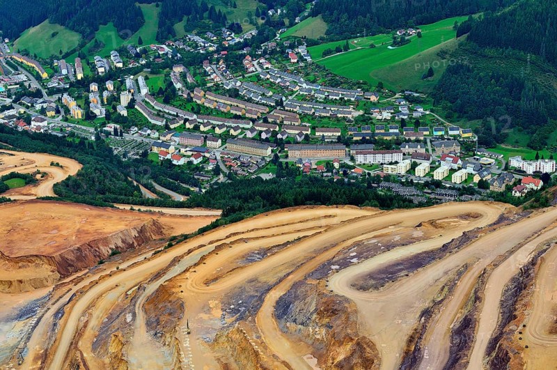 Open pit ore mining and workers' settlements