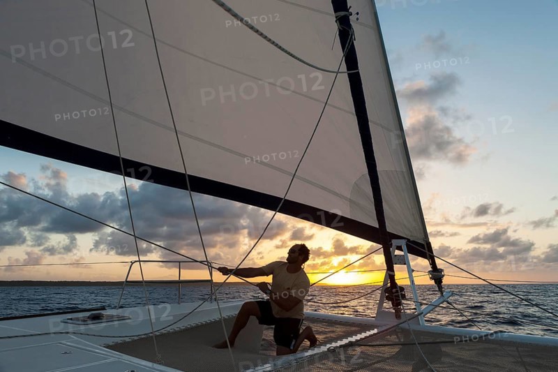 Skipper checking the tension of the sails
