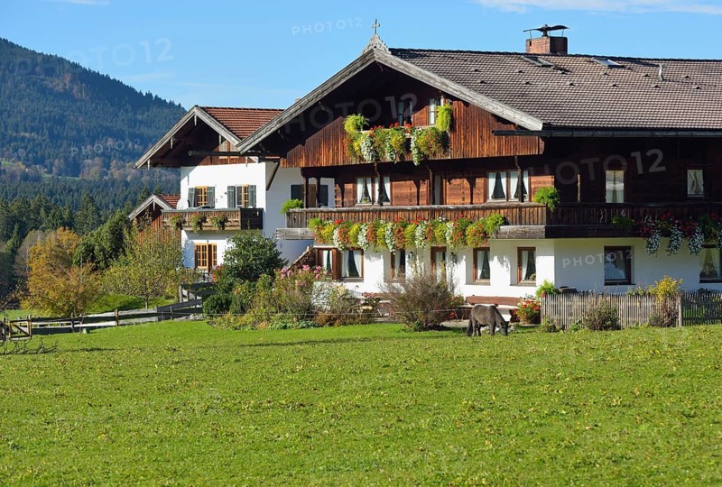 Farmhouse in the Bavarian style with wooden top