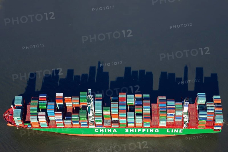 Stacked container casting long shadows