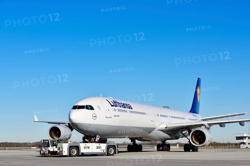 Lufthansa Airbus A340-600 with pushback truck