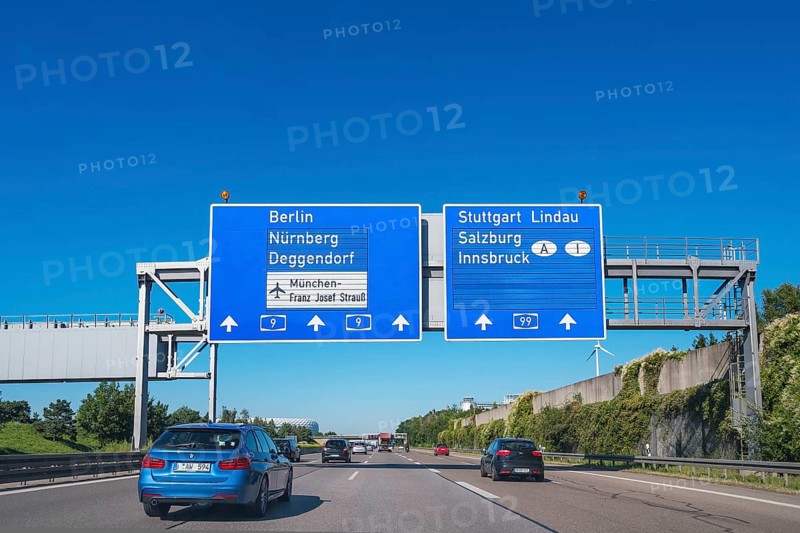 Information signs and greened noise protection wall on the A9 near Munich