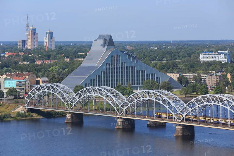 Daugava River with the Railway Bridge or DzelzceÄ¼a Tilts and the New National Library
