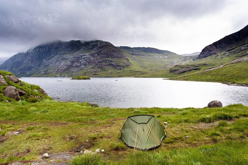 Tent next to Loch Coruisk with Cuillin Hills behind