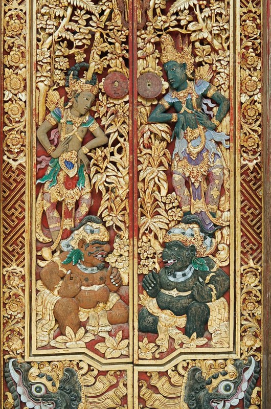 Wooden door decorated with carvings