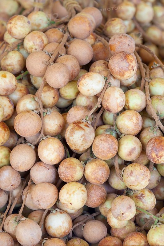 Longan fruits on display at a market