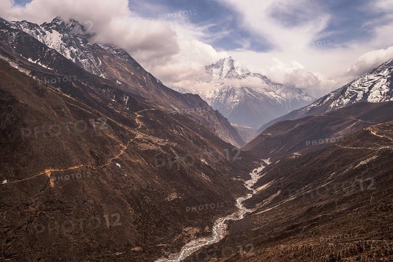Dudh Kosi river in front of mountain panorama im tje Gokyo Valley