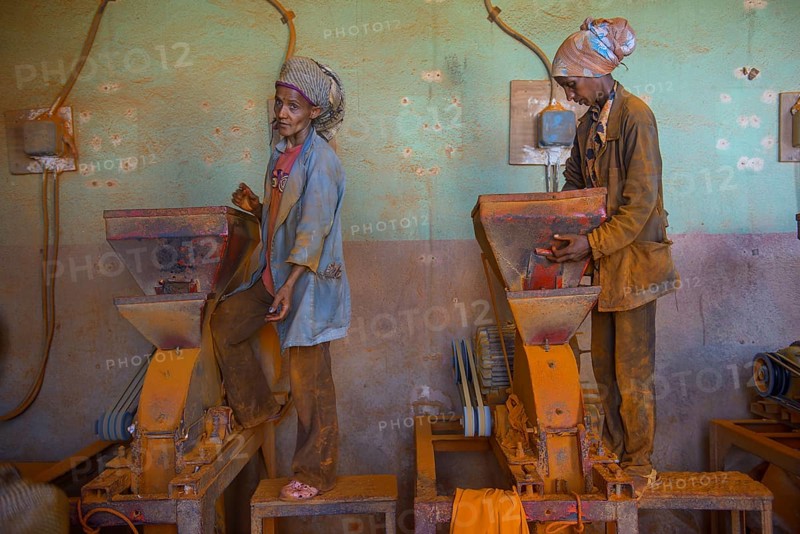 Women working in a Berbere red pepper spice factory at the Medebar market