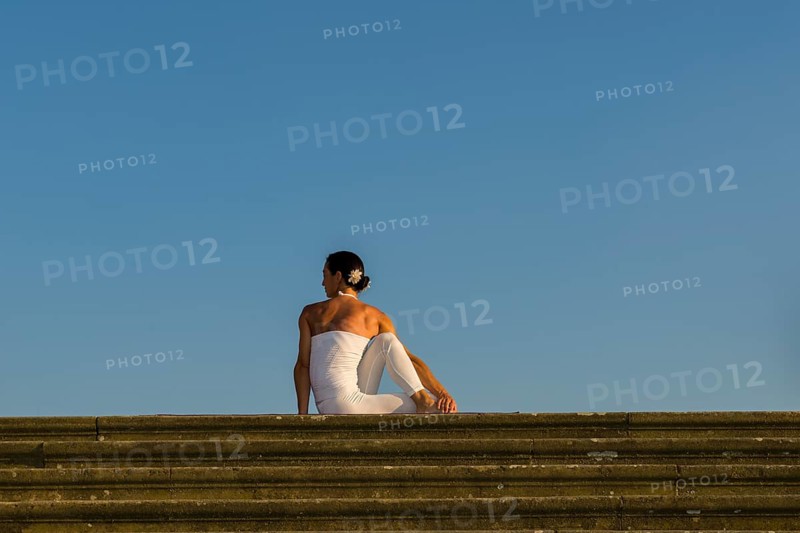 Young woman practising Hatha yoga
