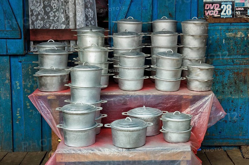 Cooking pots in a market stall