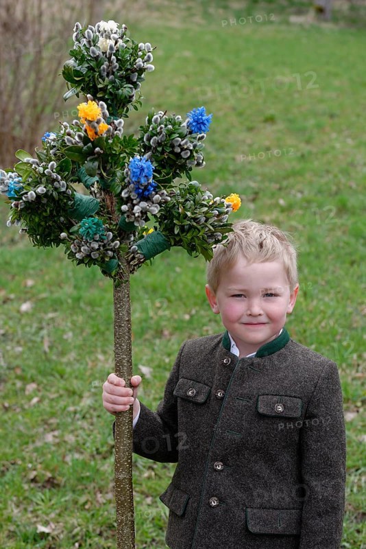 Boy with palm branches