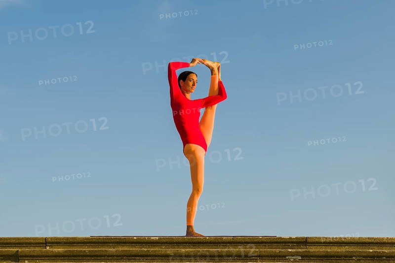 Young woman practising Hatha yoga