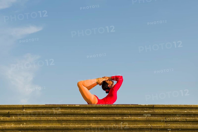 Young woman practising Hatha yoga