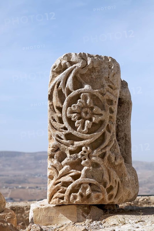 Stone with ornate relief