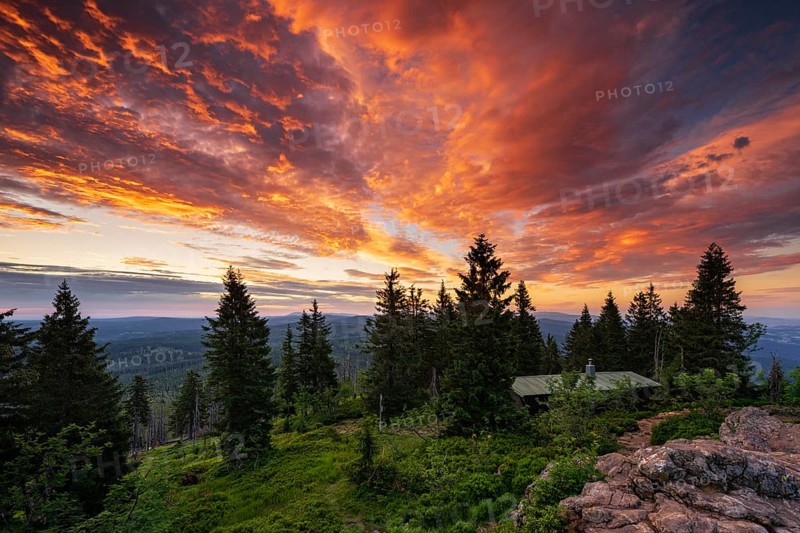 Dramatic cloud atmosphere at sunrise at the summit of the Grosser Rachel
