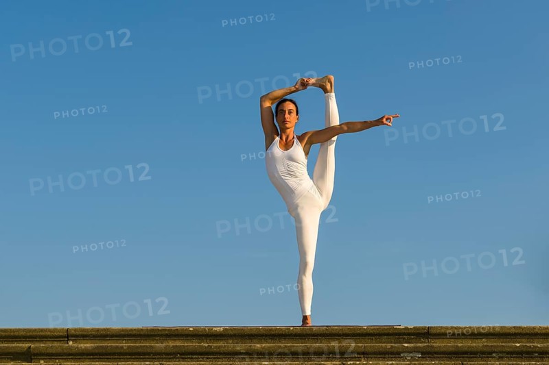 Young woman practising Hatha yoga