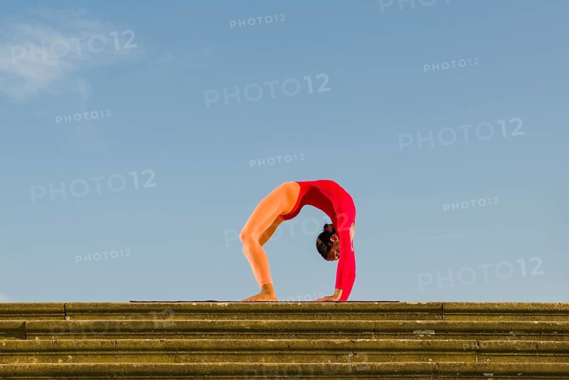 Young woman practising Hatha yoga