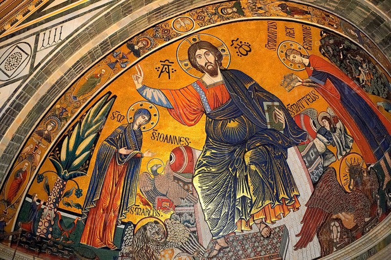 The medieval Romanesque style Byzantine mosaic of Christ between the Virgin Mary and St Minias