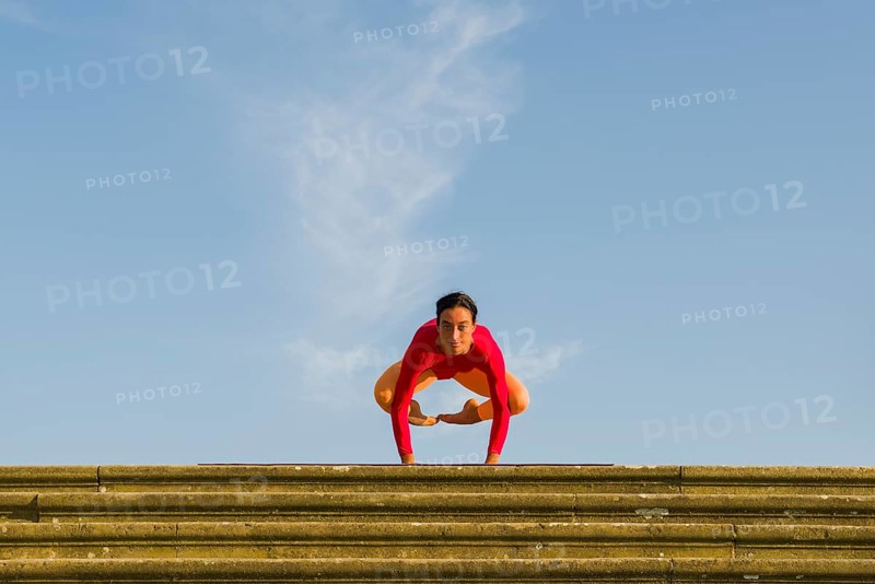 Young woman practising Hatha yoga