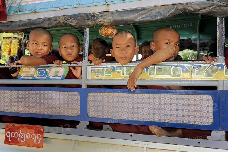Buddhist child monks taking the school bus