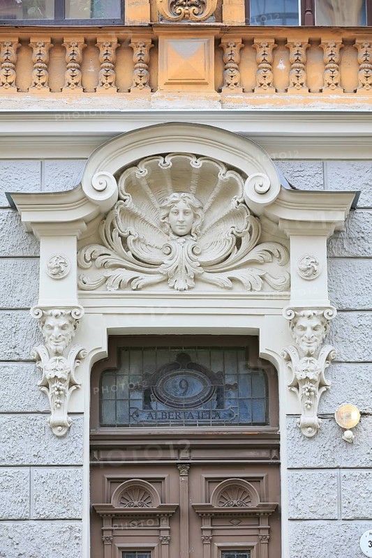 Head of a Woman in a shell above the entrance