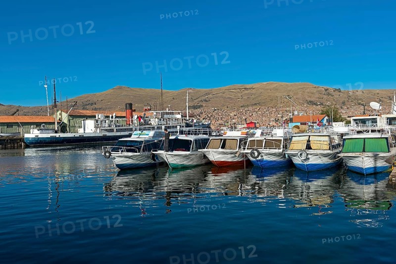 Boats in the harbour of Puno on Lake Titicaca