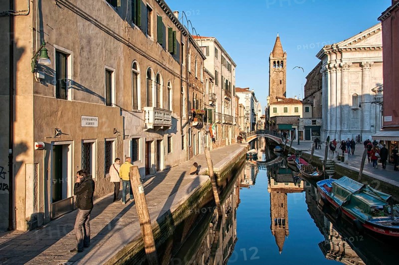 Rio de San Barnaba canal with reflections in the evening light