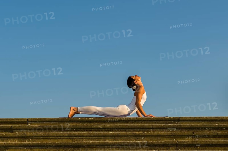 Young woman practising Hatha yoga